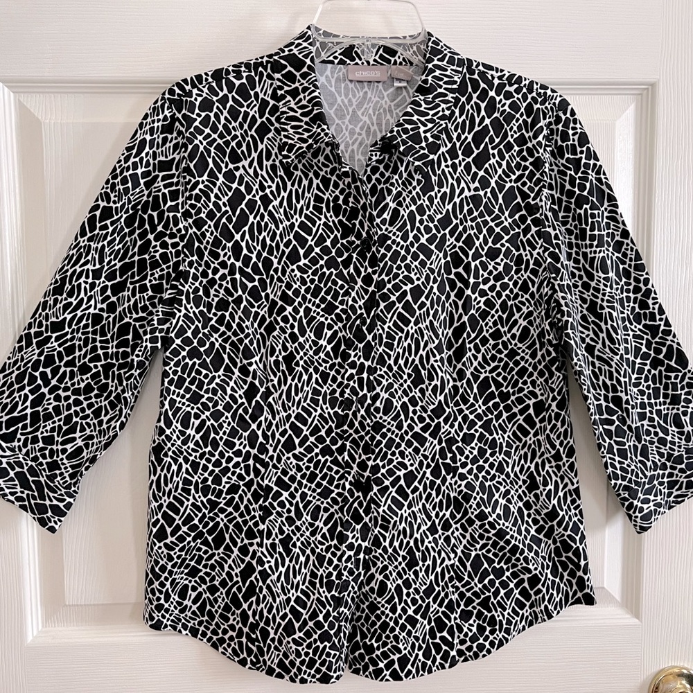 Chico’s black/white button up blouse. 3/4 sleeve. Size 1